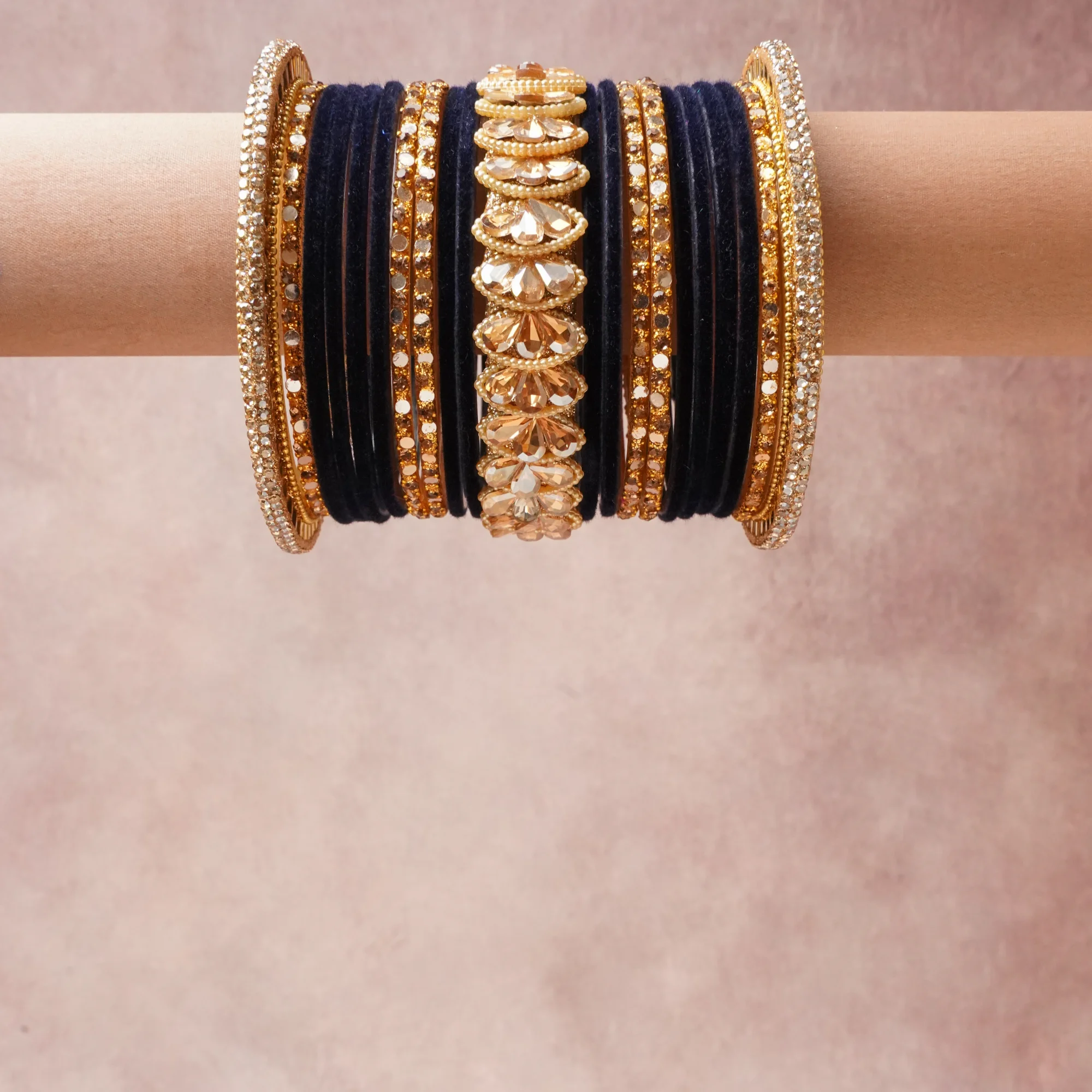 A commanding Deep Navy anchors this beautiful set, enriched with accents of Clear Diamond Simulant, Peach Champagne that add depth and dimension.

Featuring a striking composition of Velvet, Gold-Toned Metal Alloy, Faceted Crystal, Cubic Zirconia, this set carries intricate craftsmanship and strong presence. Grand in form, it is created for moments that deserve to be marked.